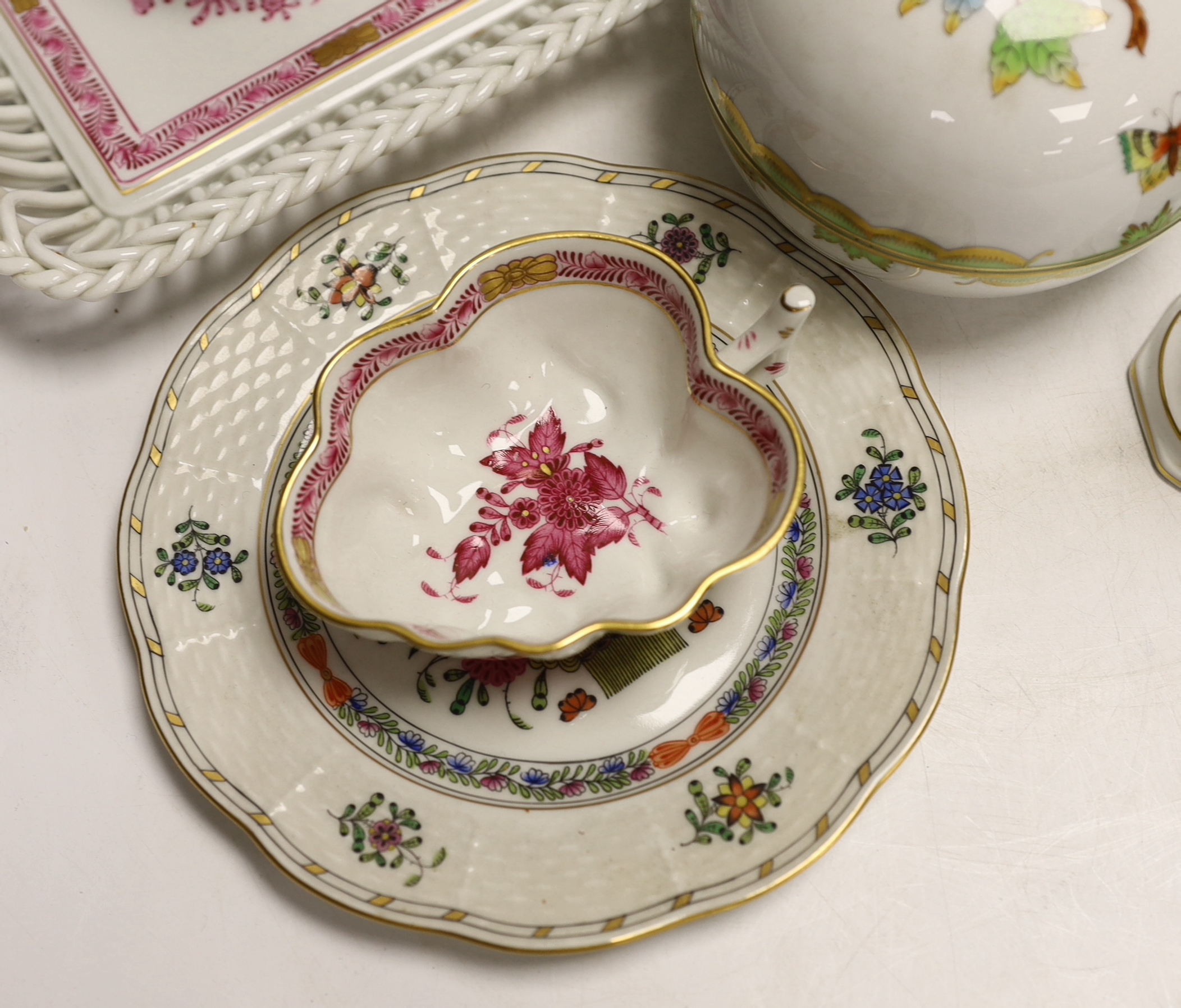 A group of Herend, Hungary porcelain wares including; a covered dish, tray, candlestick, two pedestal vases, boy on a goose, etc. tallest 13cm